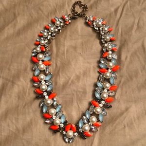 Orange, pearl, blue bead necklace.